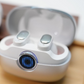 Wireless earbuds with real-time AI translation, noise cancellation, Hi-Fi audio, triple-microphone calls, touch controls, IPX5 water resistance, and a charging case with LEDs